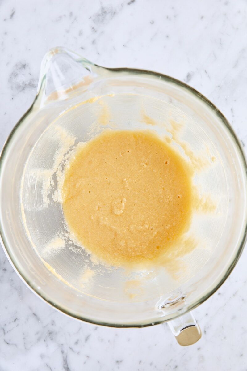 Eggs and egg yolk mixed into batter