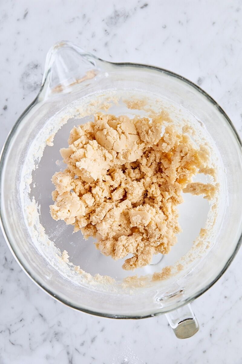Lemon shortbread dough in mixed bowl