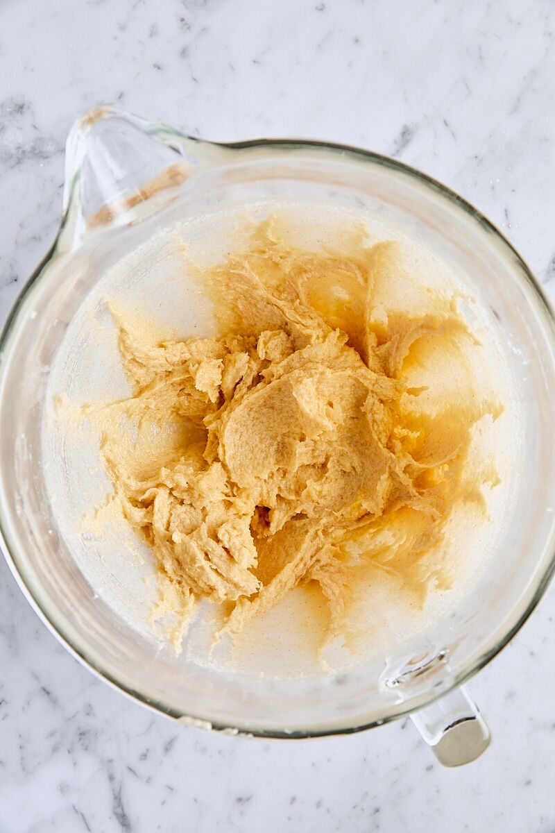 Large egg, egg yolk, and vanilla mixed into dough