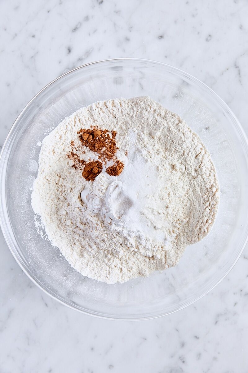 All-purpose flour, cream of tartar, baking soda, cinnamon, and salt in medium glass bowl