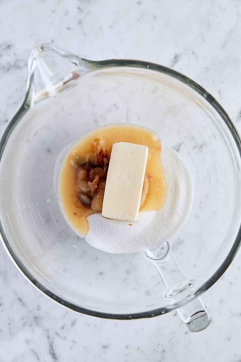 Room temperature butter, cooled brown butter, and granulated sugar in glass mixer bowl