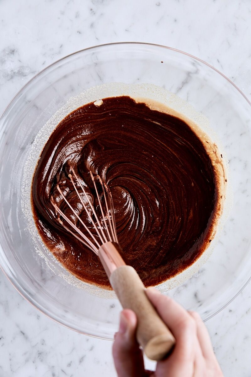 Melted chocolate mixture added to egg mixture