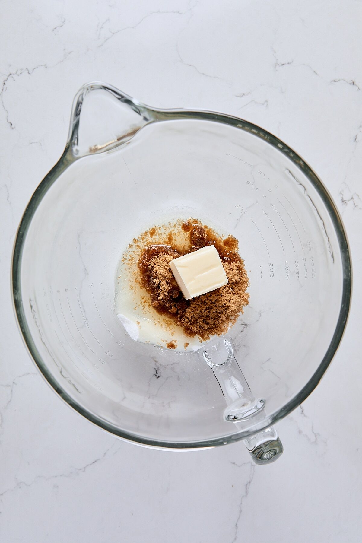 Butter, oil, granulated sugar, and dark brown sugar in mixer bowl