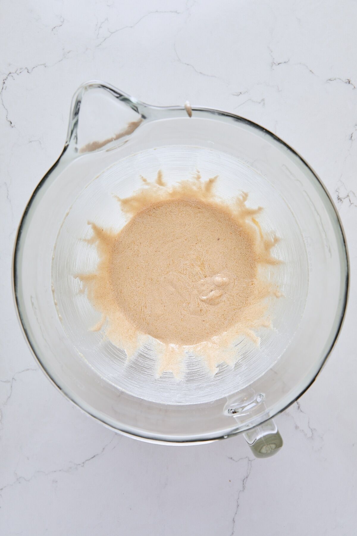 Egg and vanilla mixed into batter