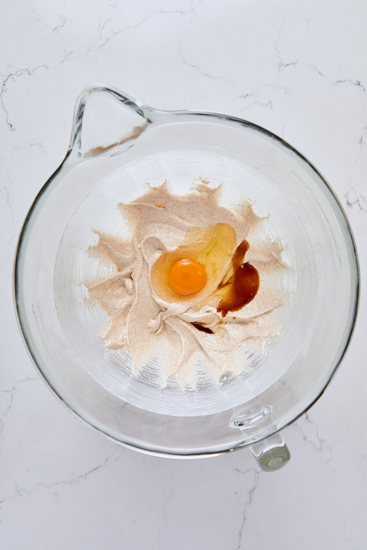 Egg and vanilla added to mixer bowl