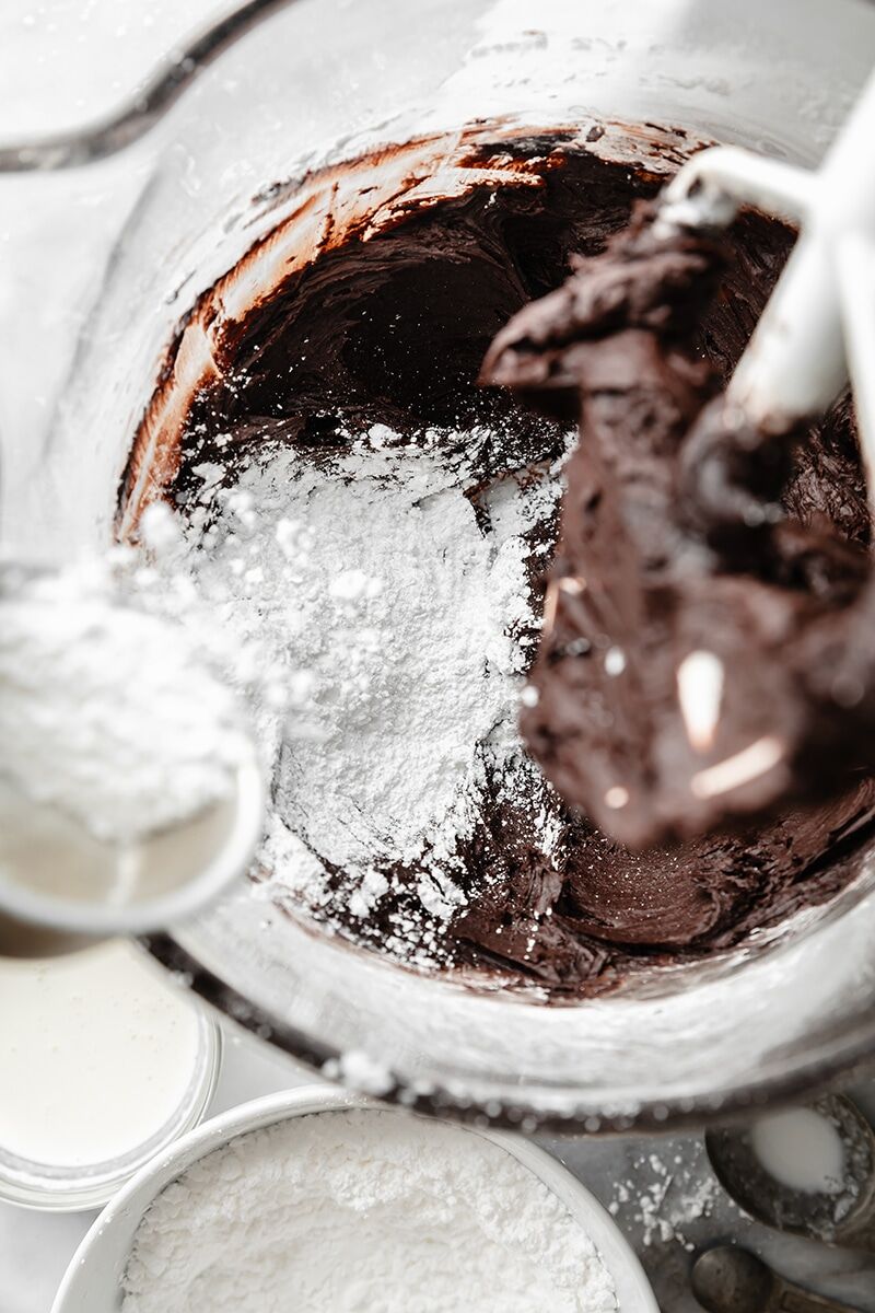 Powdered sugar gradually added to cocoa mixture