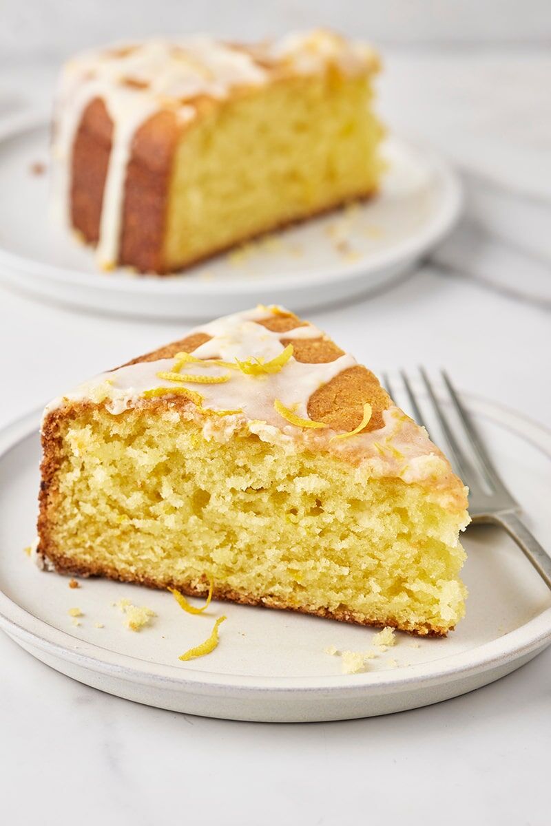 Lemon glaze drizzled over lemon olive oil cake