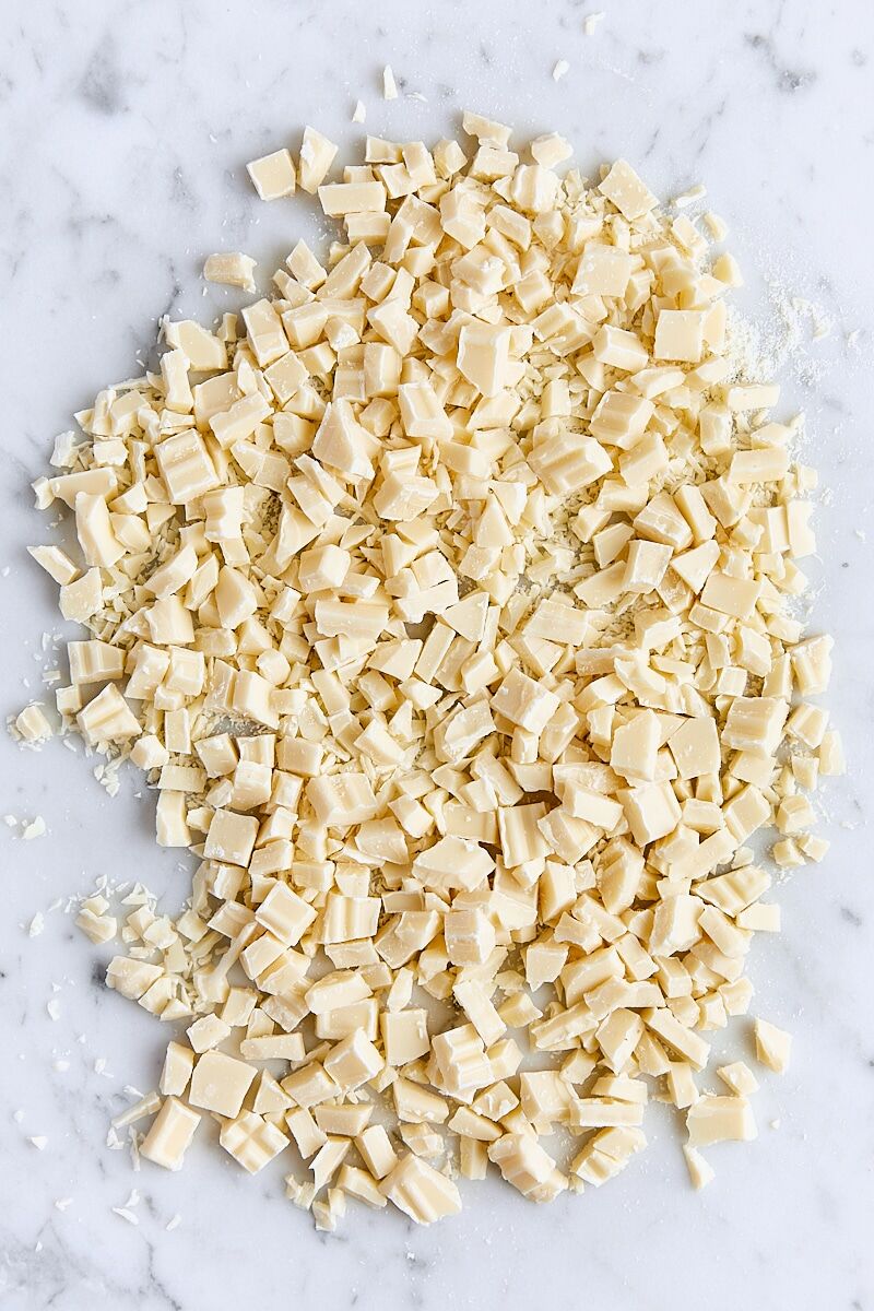 White chocolate chopped on marble board