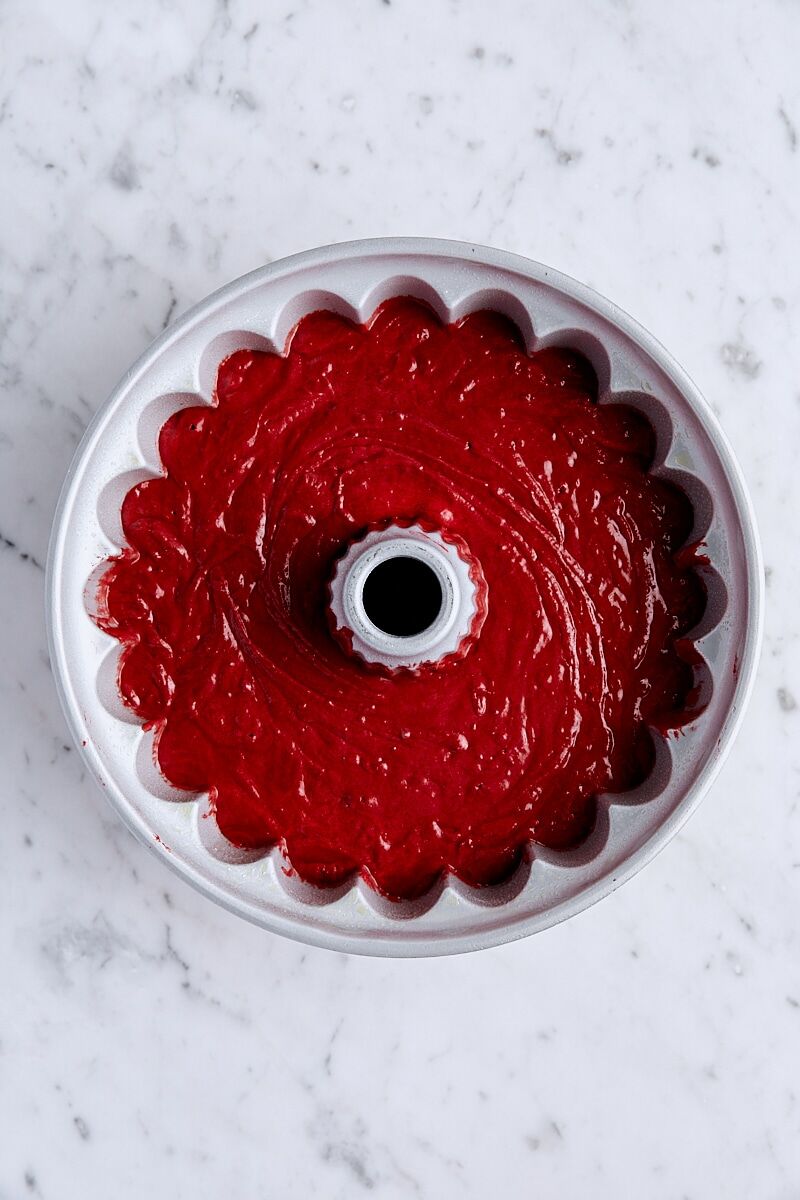 Red velvet bundt cake batter in 10-cup bundt pan