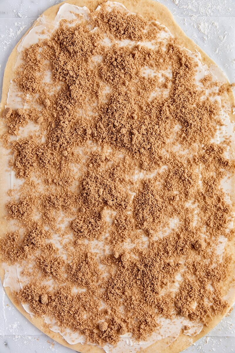 Dough rectangle topped with brown sugar-cinnamon filling