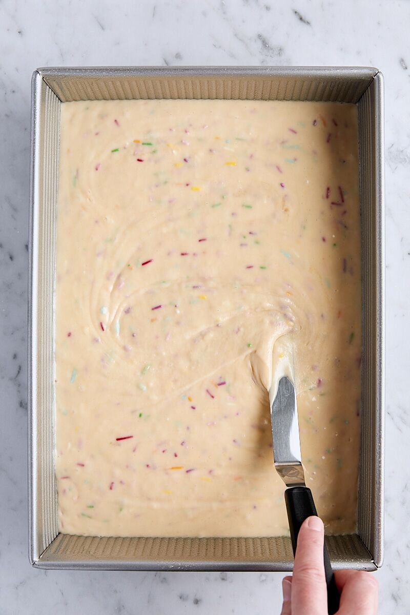 Funfetti cake batter in 13 x 9-inch rectangular baking pan