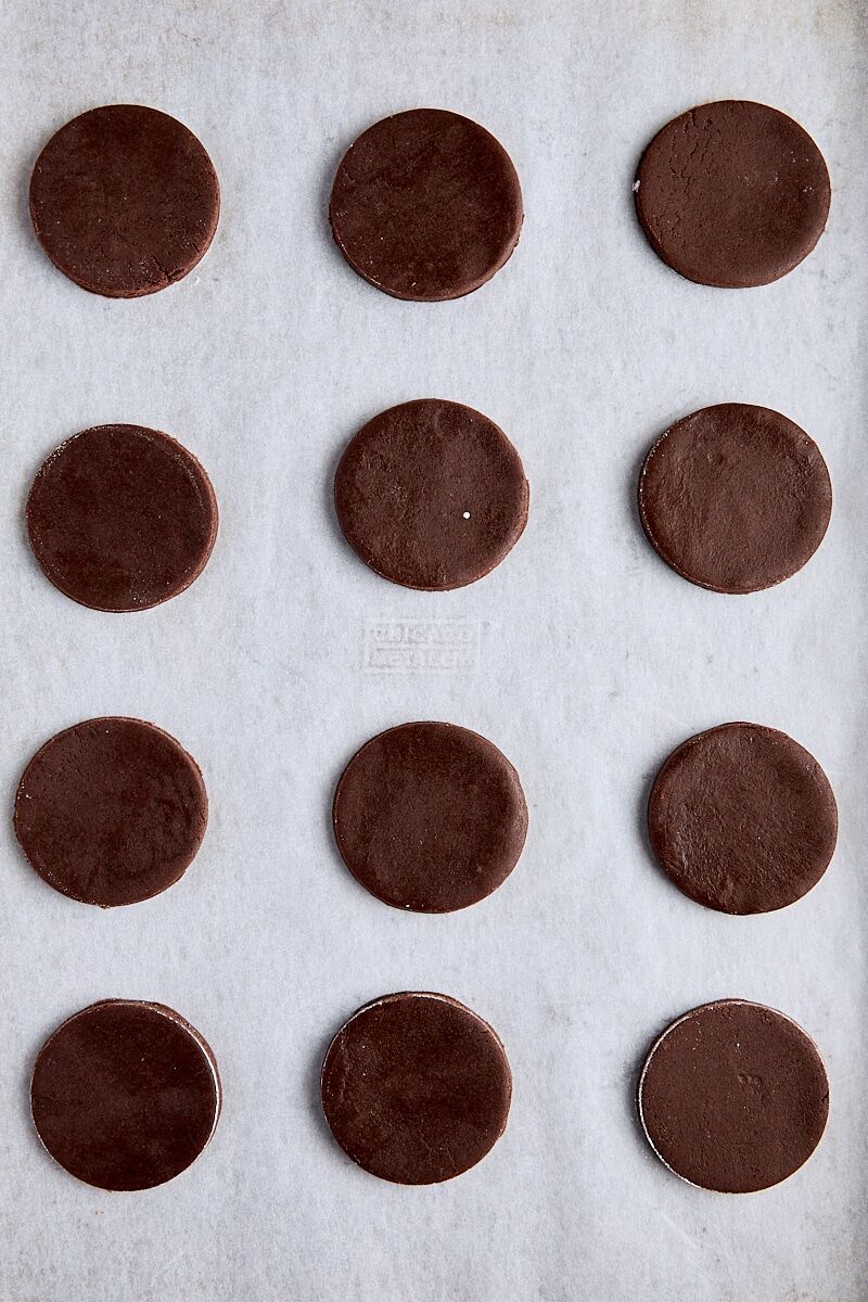 Unbaked thin mint cookies on parchment-lined baking sheet