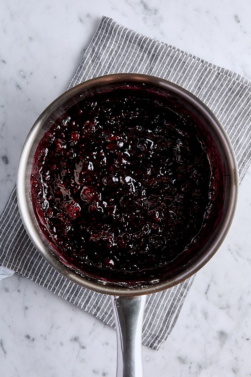 Cooked blackberry filling in saucepan