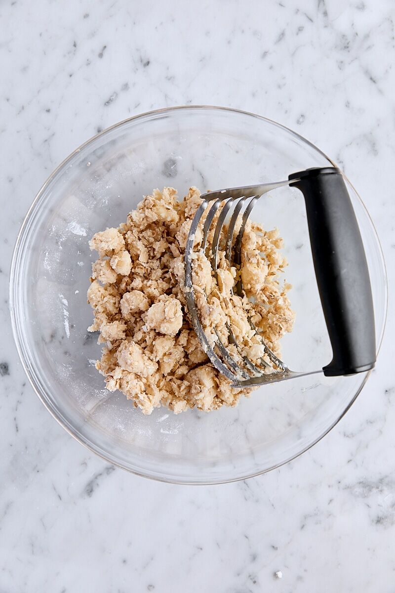 Cubed butter cut into dry ingredients with a pastry cutter