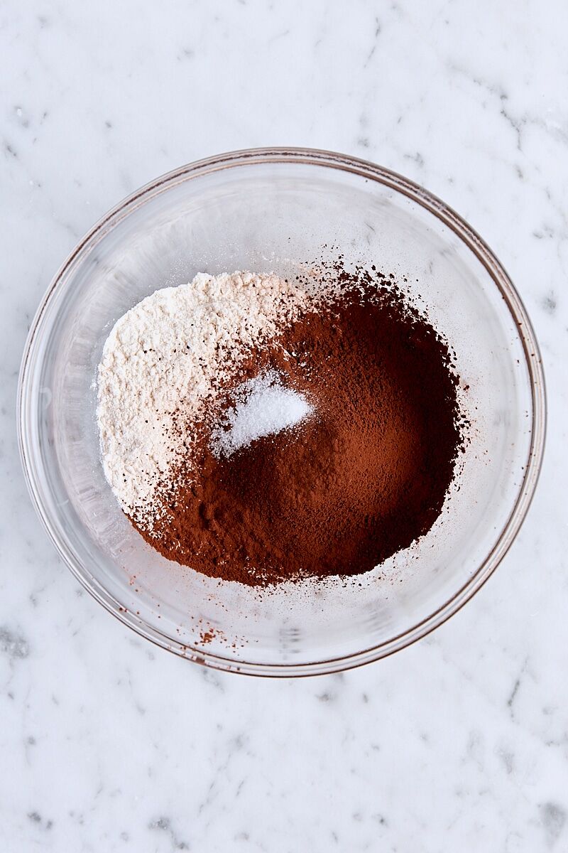 Flour, Dutch process cocoa, and salt in glass bowl