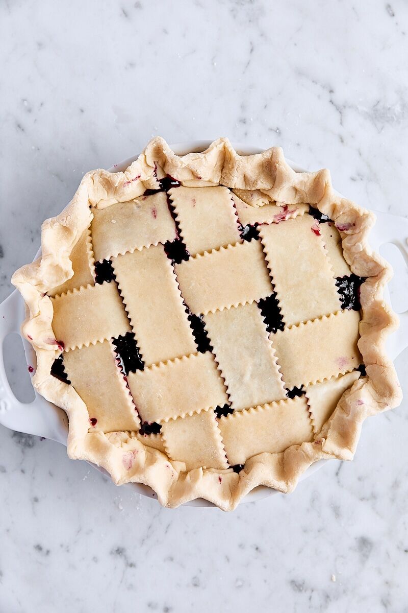 Assembled blueberry pie in pie pan