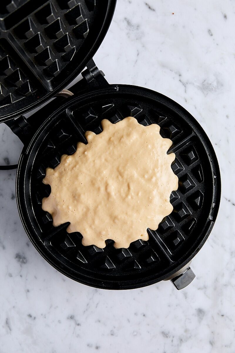 Batter poured onto Belgian waffle maker