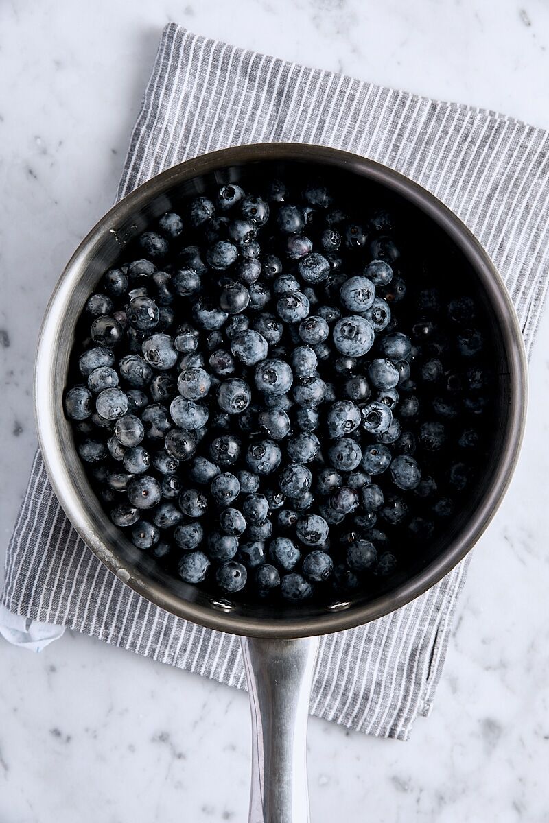 Fresh blueberries in saucepan