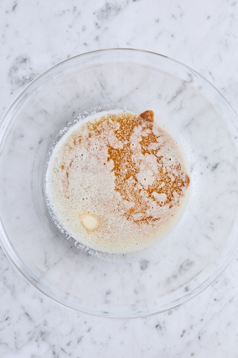 Melted butter and peanut butter in glass bowl