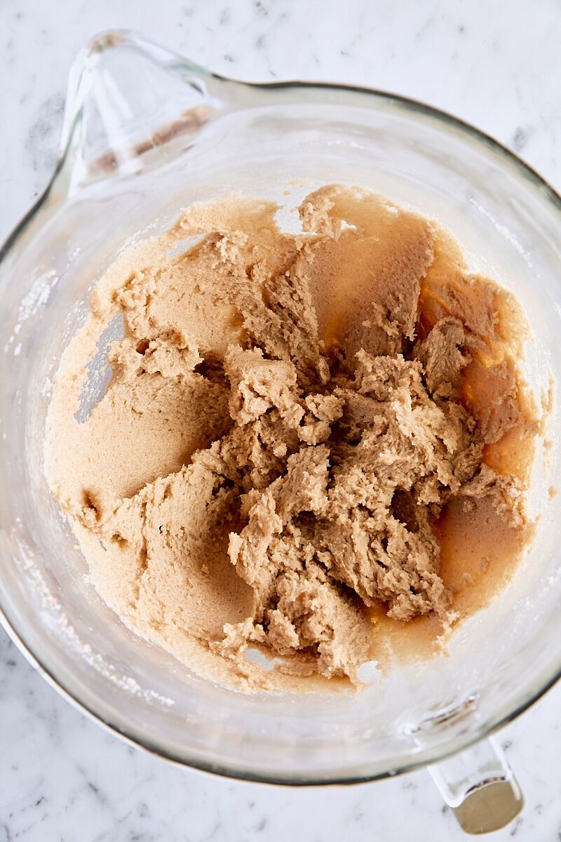 Butter and sugars mixed until creamy in glass mixing bowl