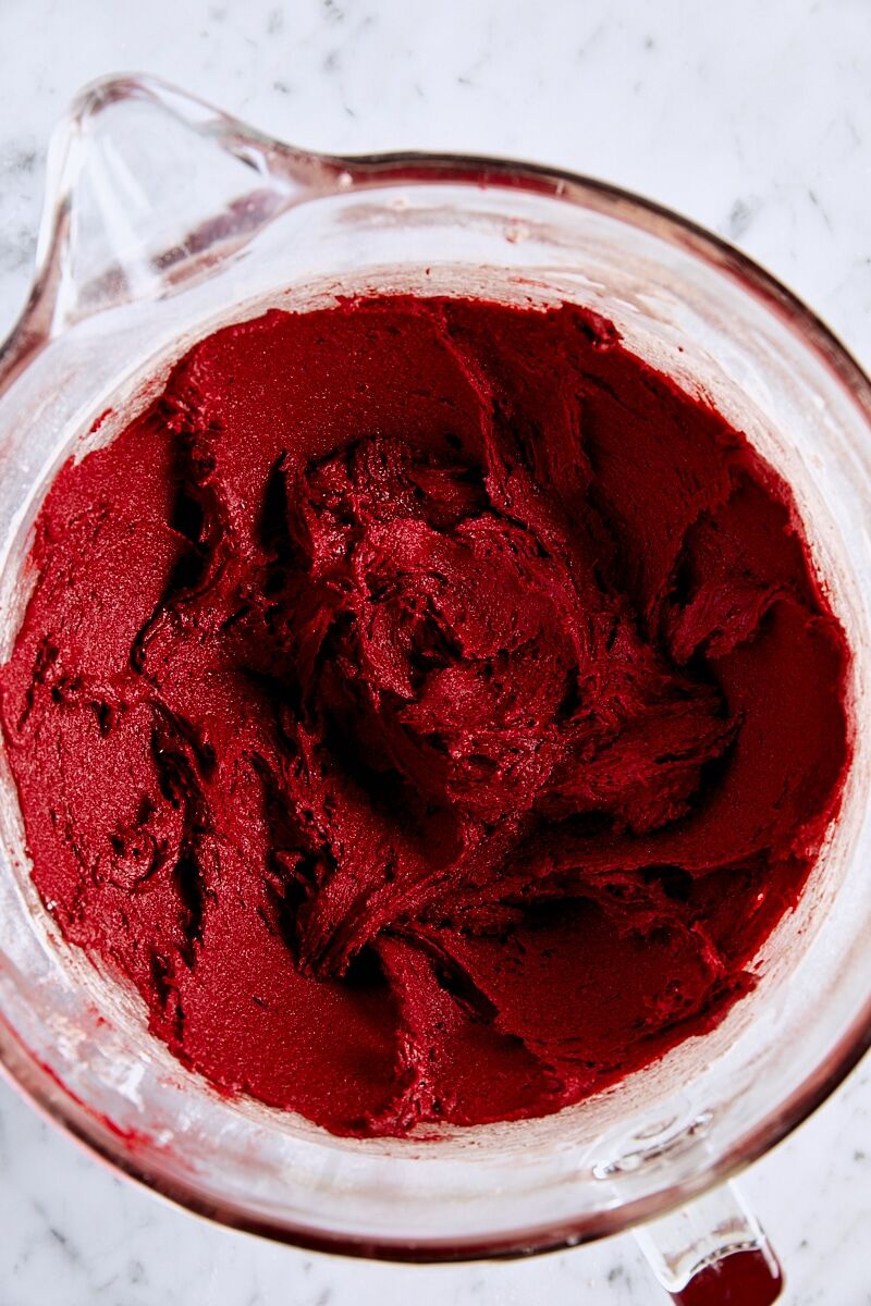 Milk mixed into red velvet cookie dough