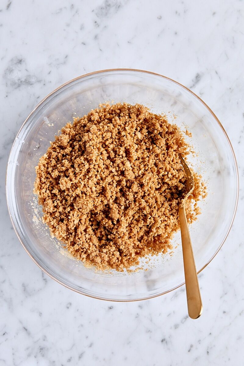 Mixed graham cracker crust in glass bowl