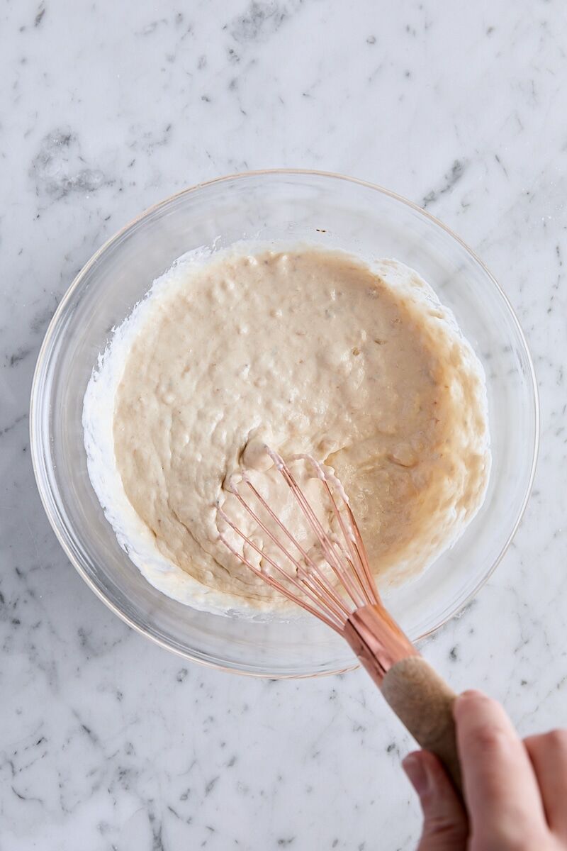Wet ingredients whisked together in glass bowl
