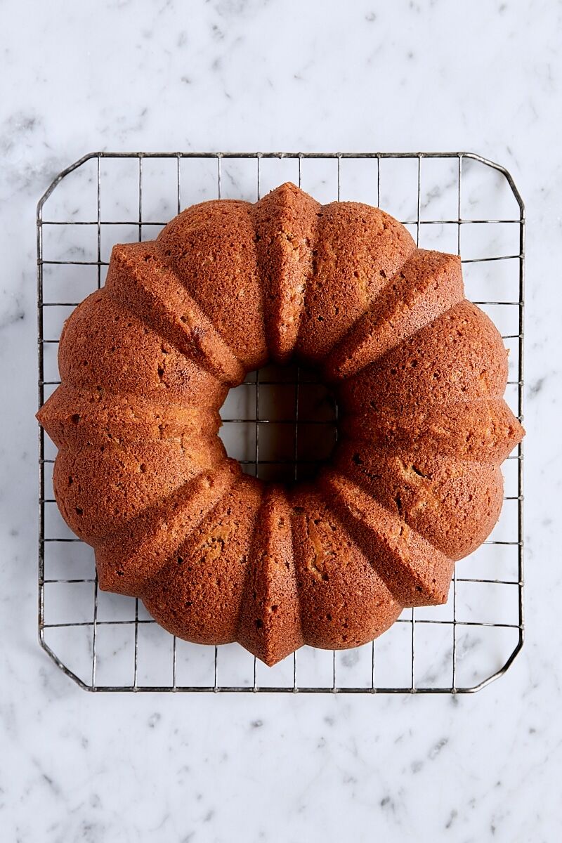 Baked spice bundt cake on wire cooling rack