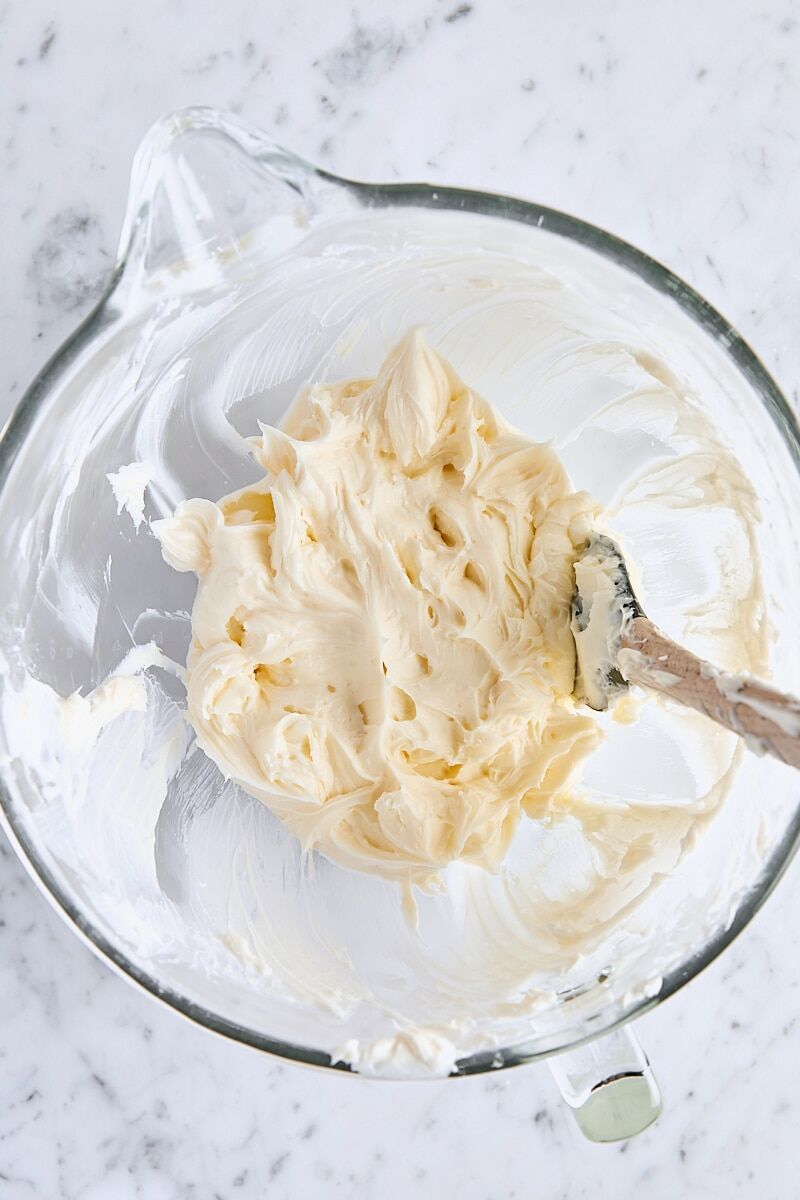 Cream cheese mixture in glass mixing bowl