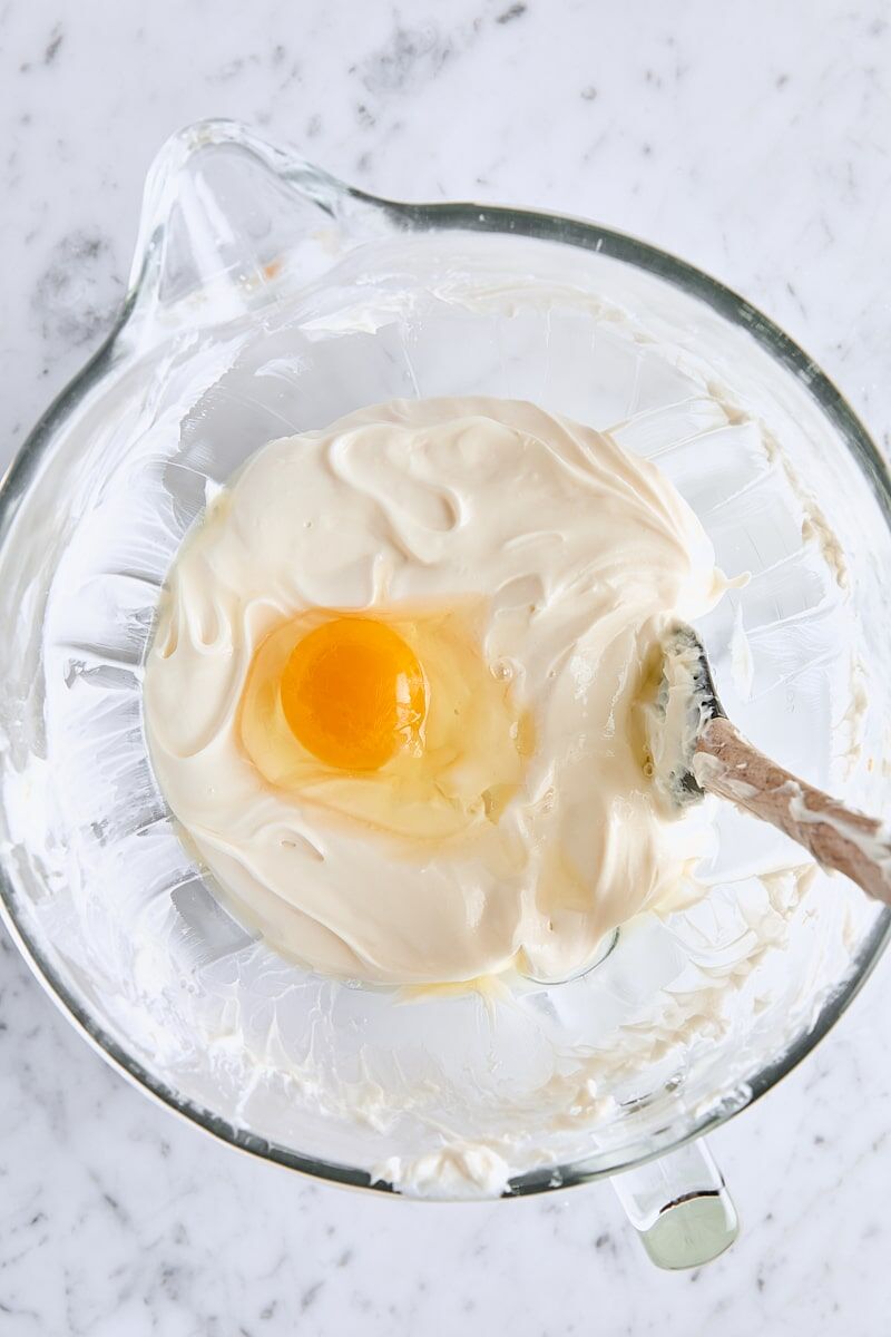 Large egg added to cheesecake batter