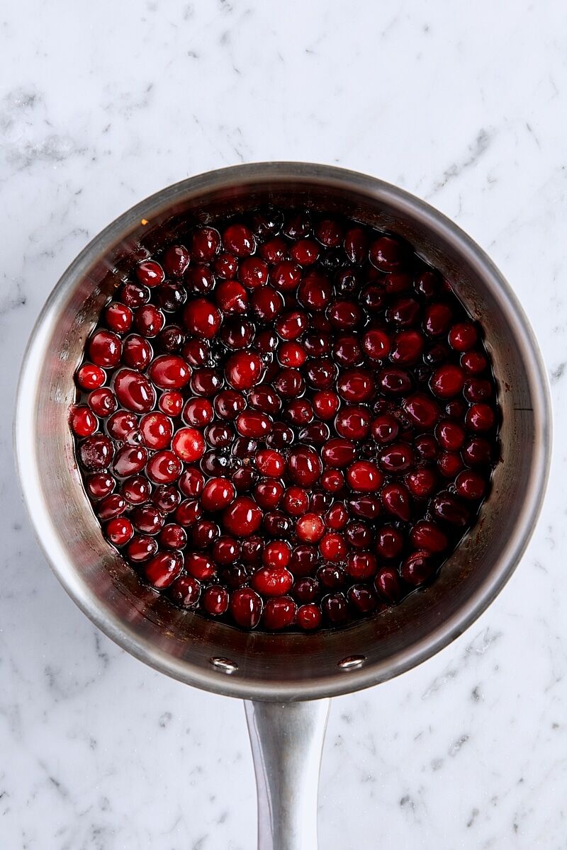 Cranberries brought to a boil in saucepan