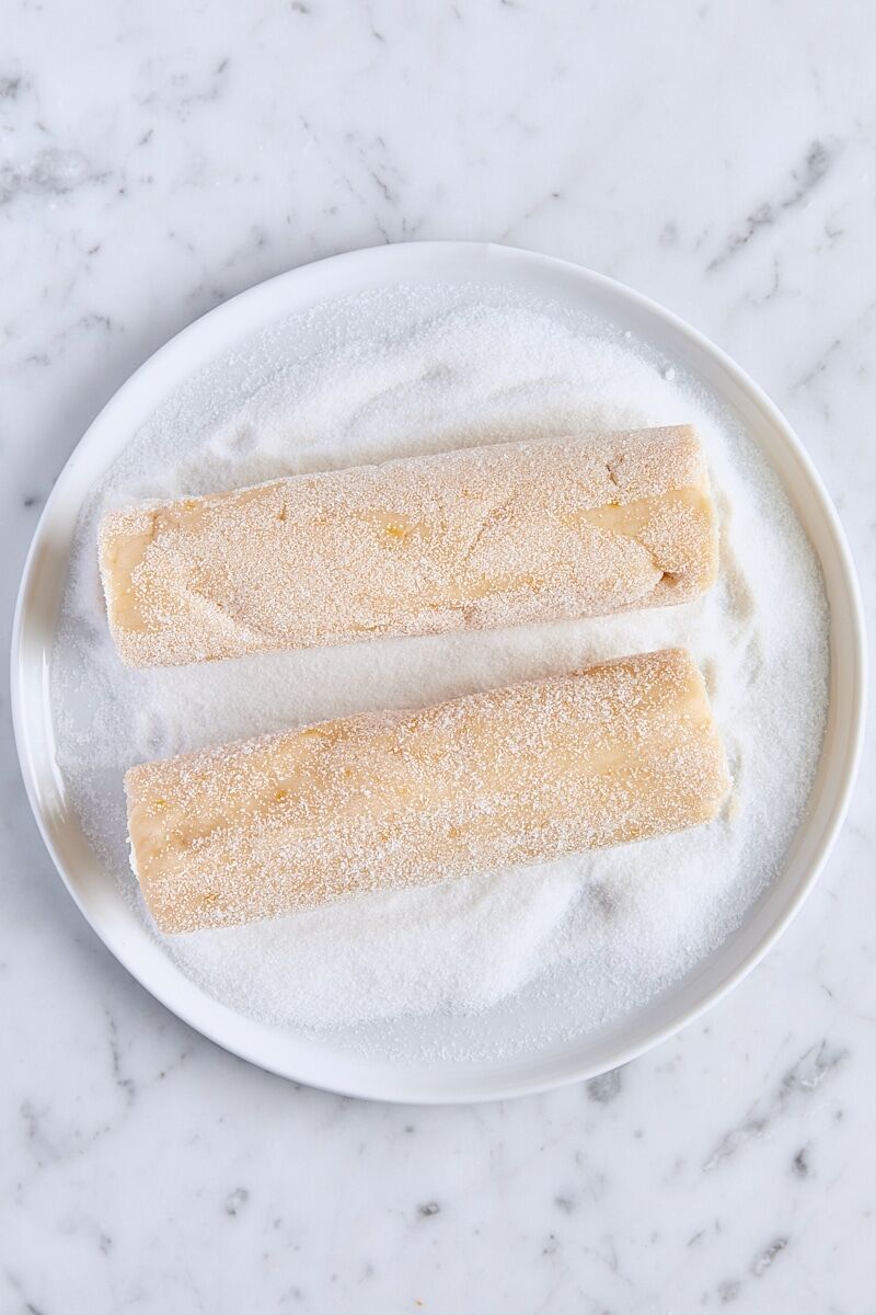 Shortbread logs rolled in granulated sugar