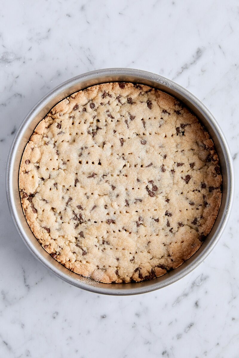 Baked chocolate chip shortbread in round cake pan