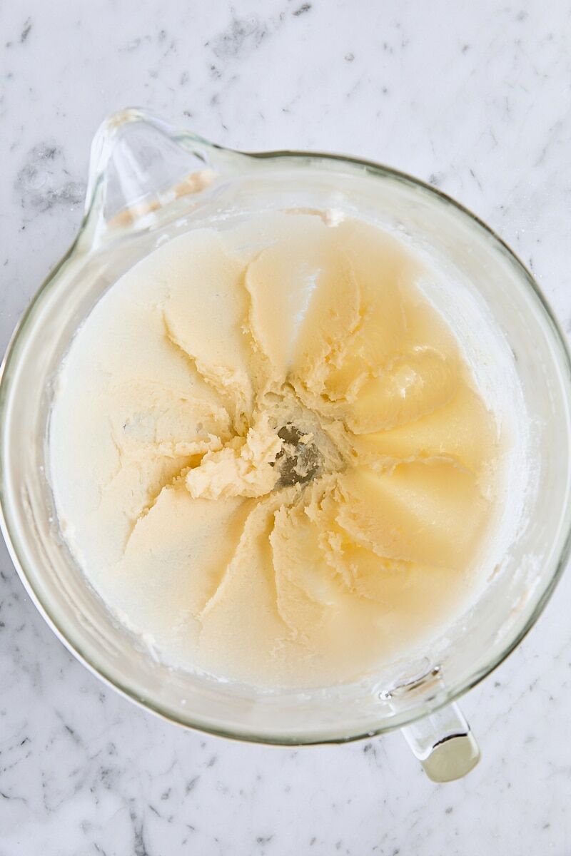 Softened butter, granulated sugar, vanilla, almond extract, and salt mixed until soft and creamy