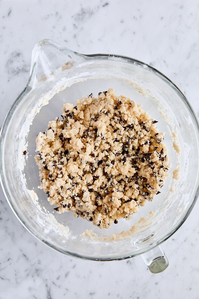 Chocolate chip shortbread dough in mixing bowl