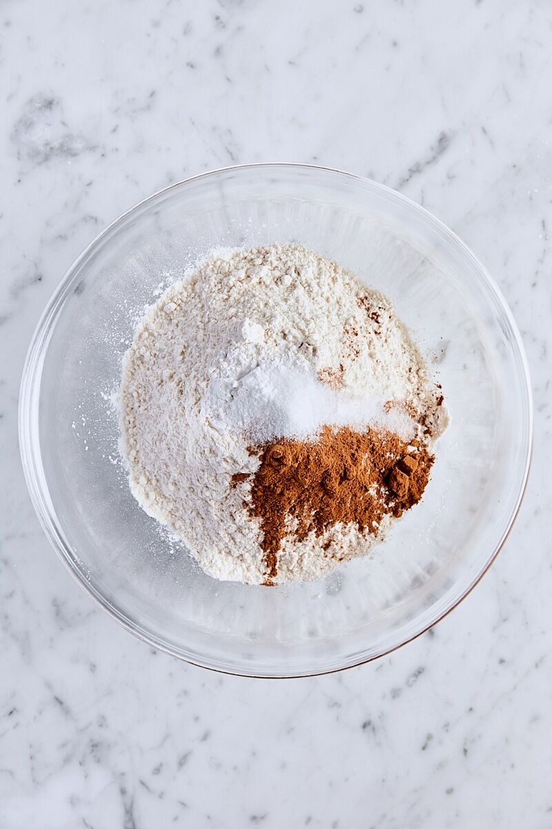 All-purpose flour, cream of tartar, baking soda, cinnamon, and salt in medium glass bowl
