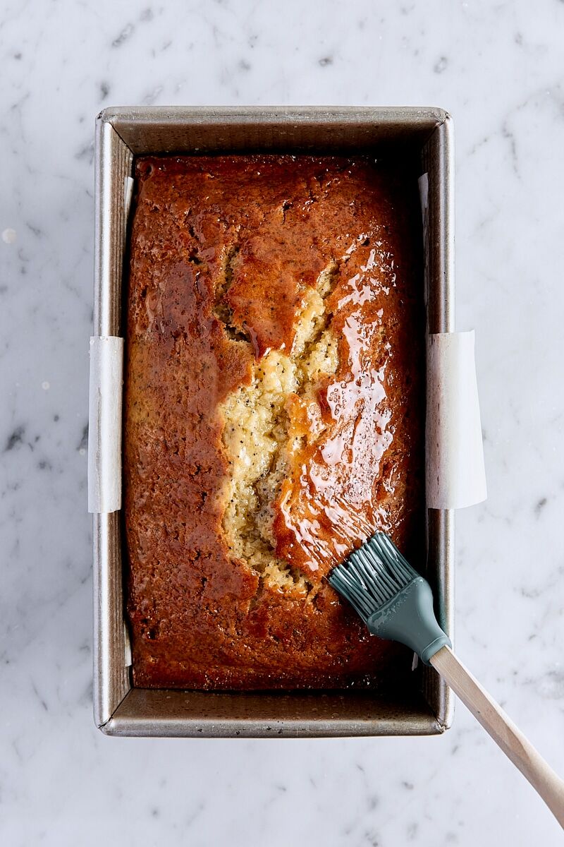 Baked lemon poppy seed cake brushed with lemon syrup