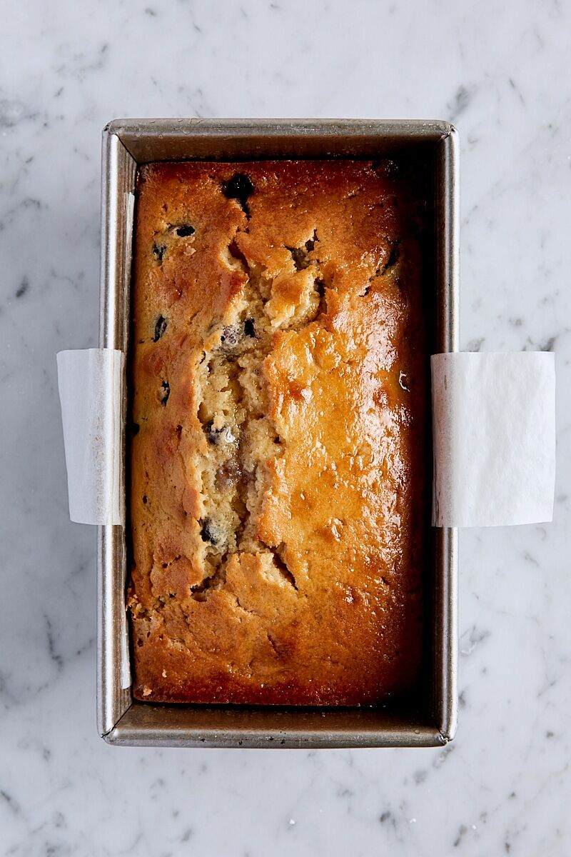Baked blueberry lemon loaf cake topped with lemon syrup