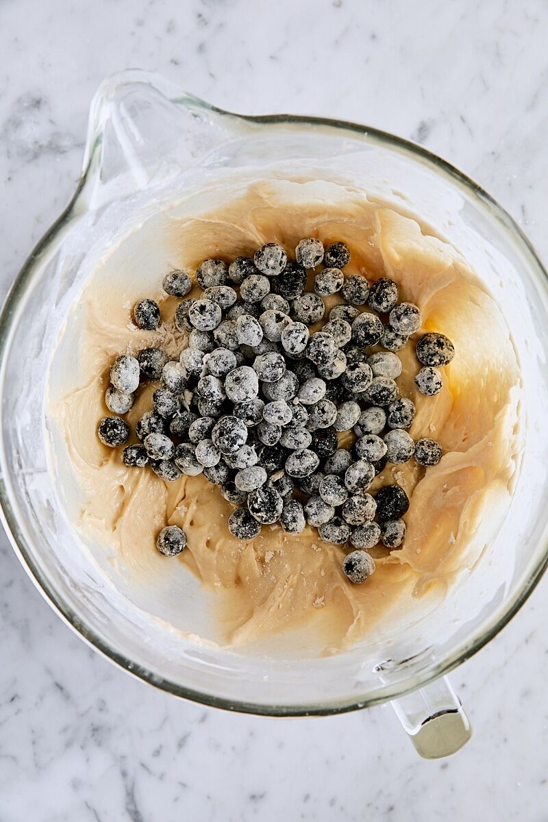 Fresh blueberries added to loaf cake batter