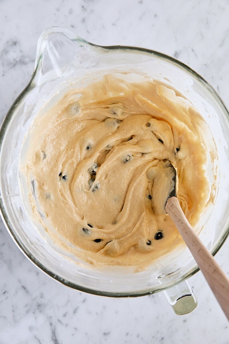 Blueberries folded into batter with spatula
