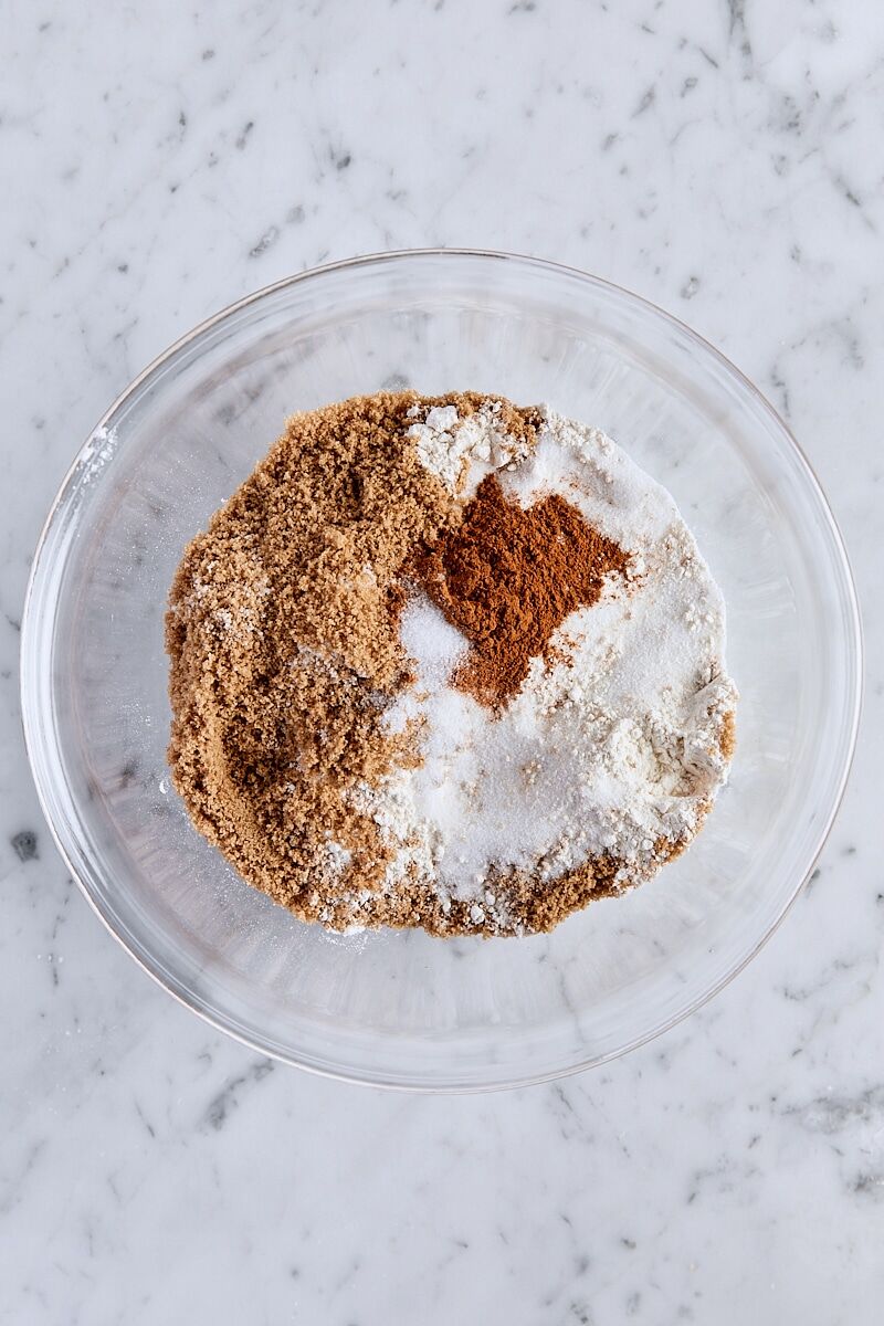 All-purpose flour, dark brown sugar, granulated sugar, cinnamon, and salt in a glass bowl