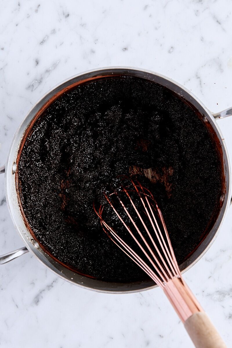Cocoa powder and salt whisked into butter-sugar mixture