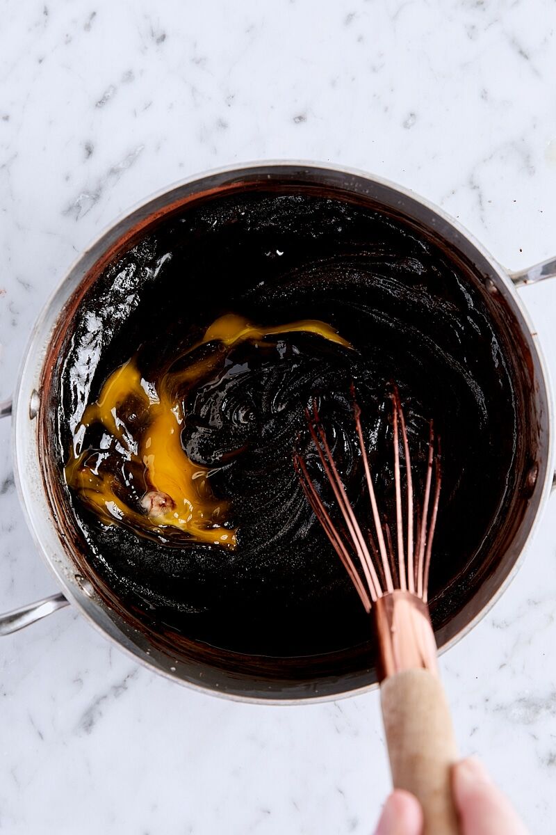 Whisking egg into brownie batter