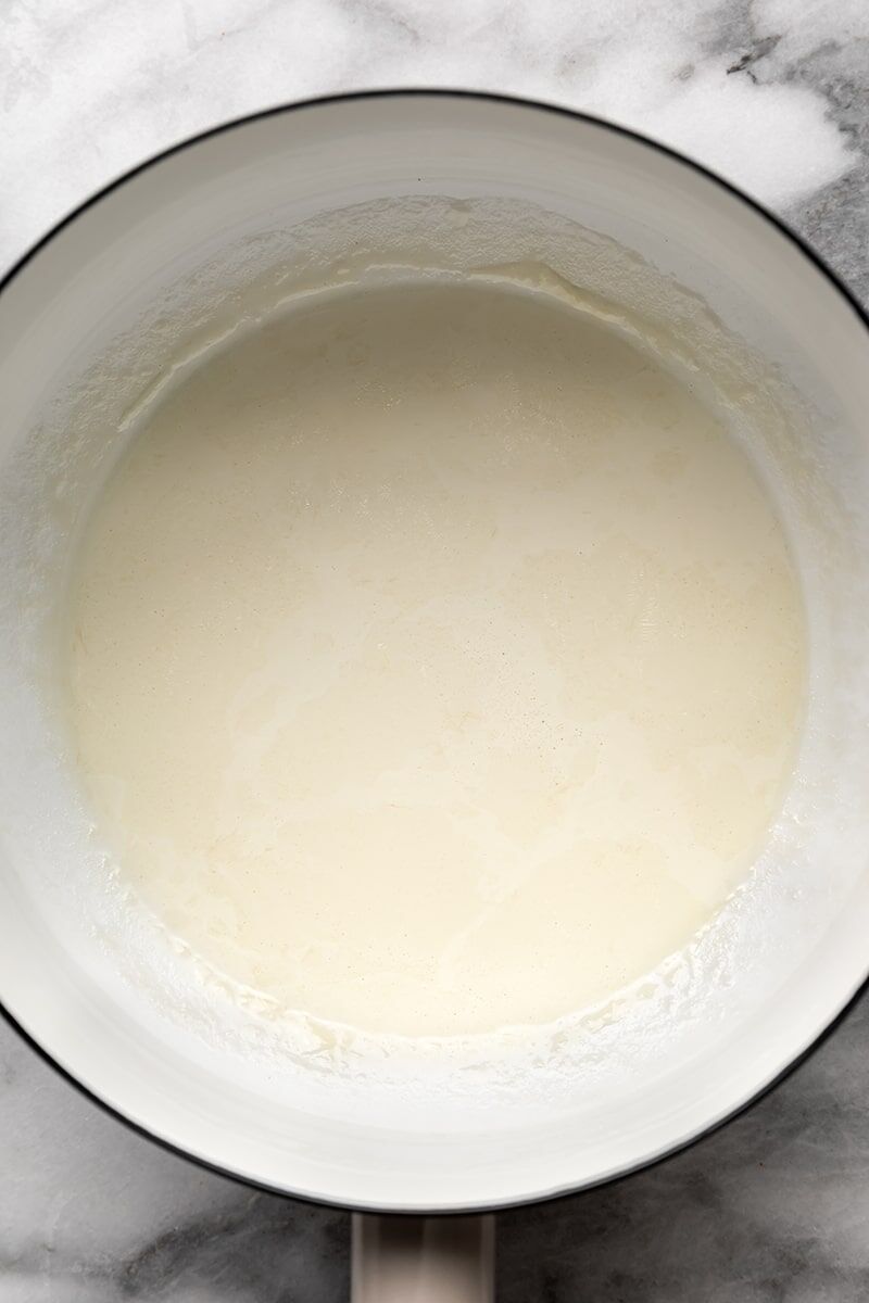Heavy cream heated in small saucepan