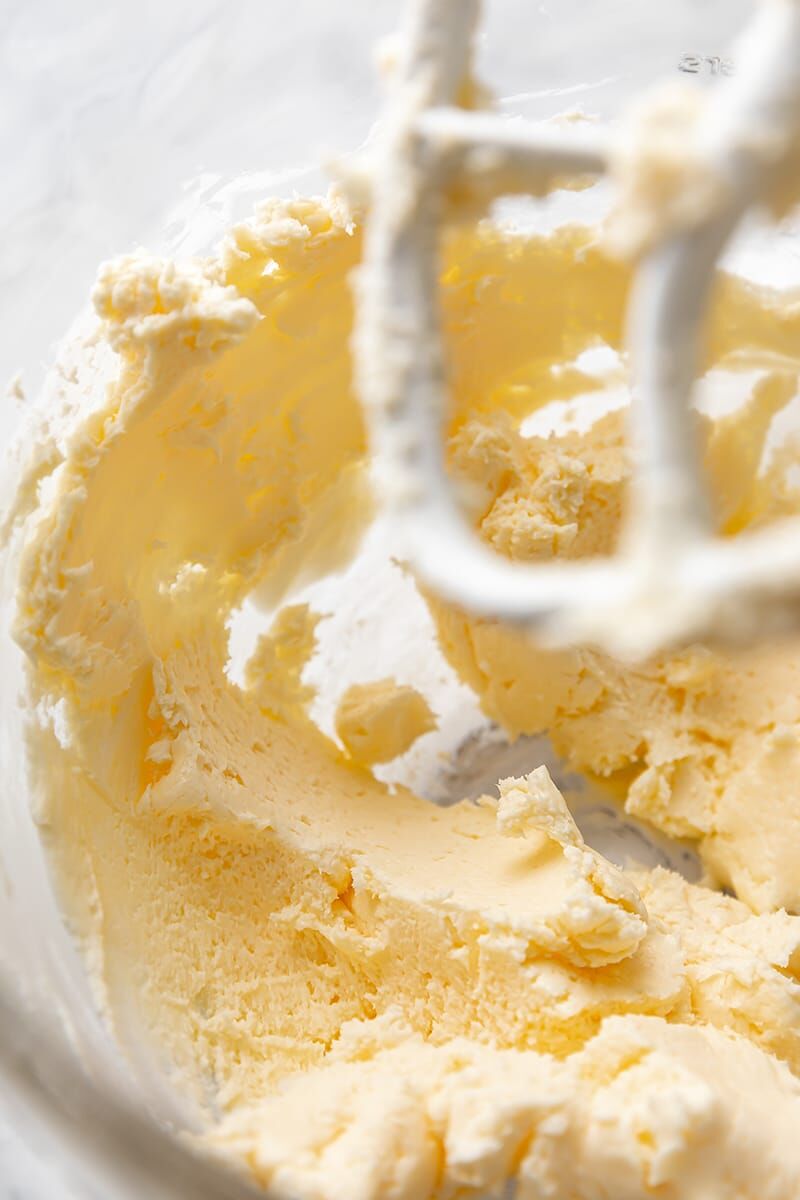 Butter, cream cheese, and salt combined in glass mixer bowl