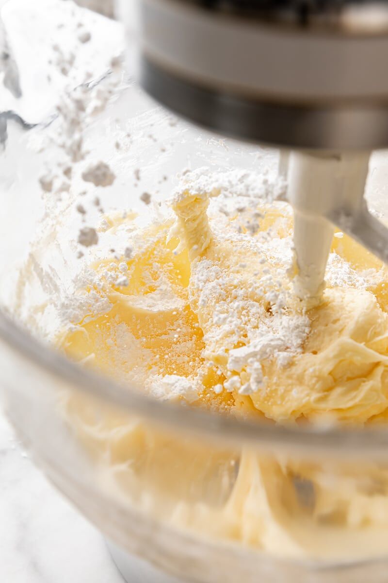 Powdered sugar gradually added to cream cheese mixture