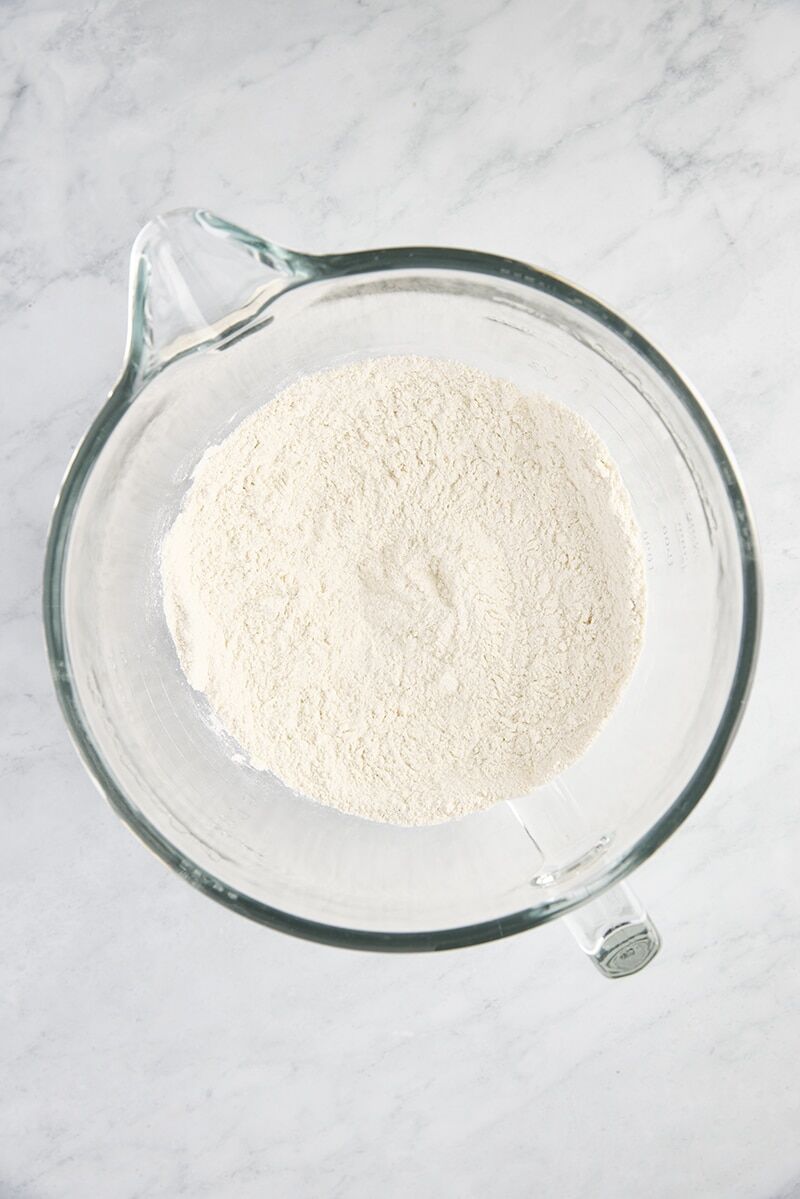 Dry ingredients combined in glass mixer bowl