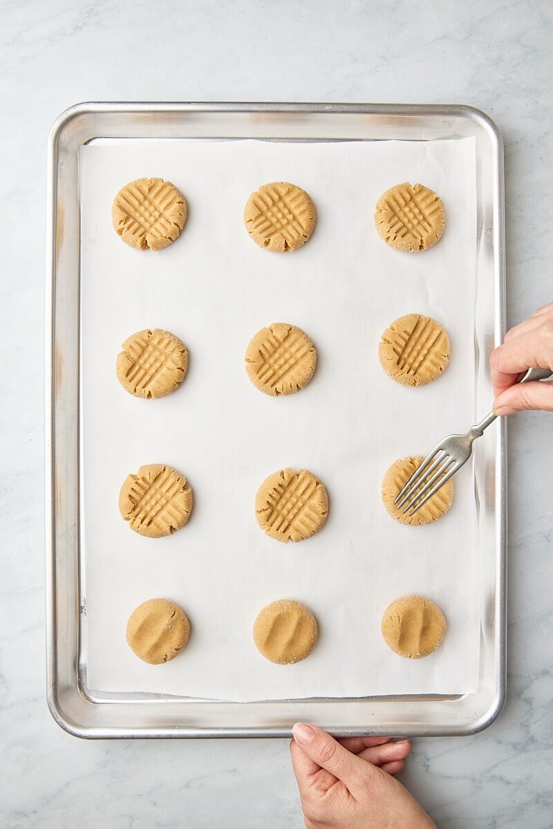 Dough balls pressed with tines of fork