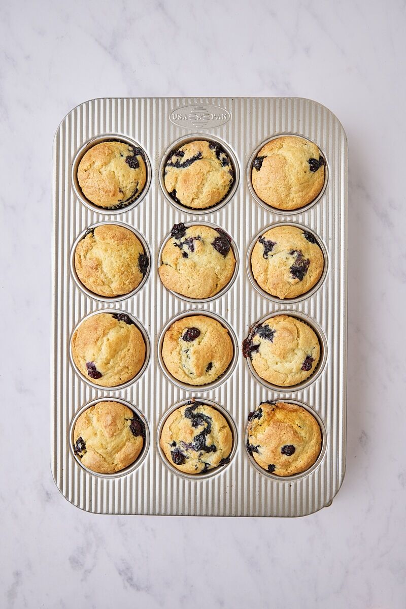 Baked lemon blueberry muffins in pan