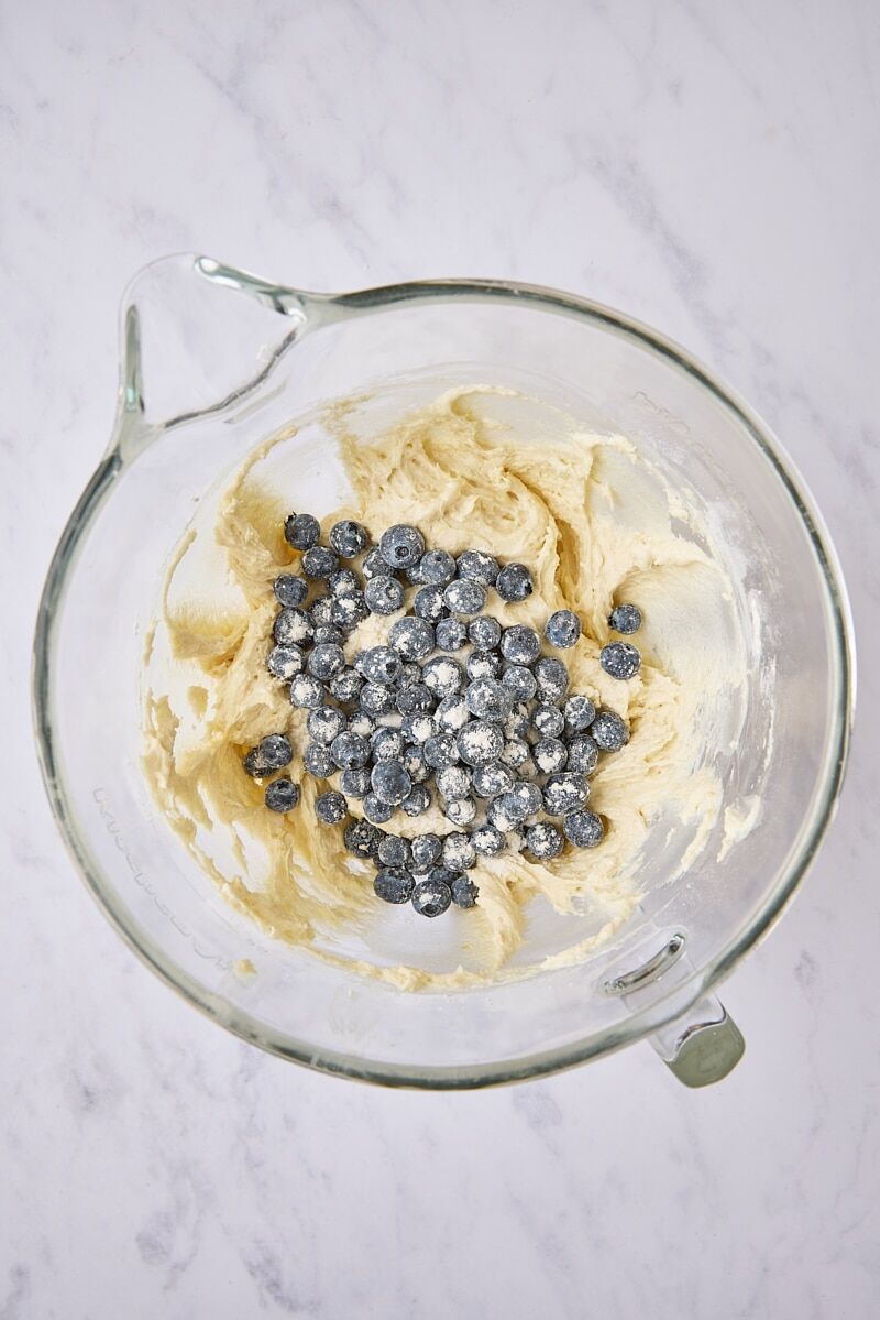 Flour-coated blueberries added to batter